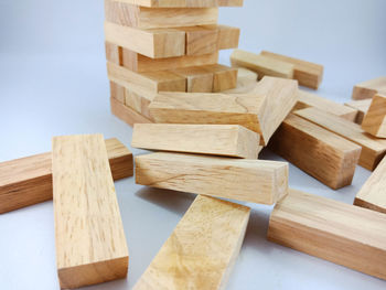 Close-up of jenga against white background