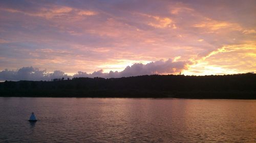 Silhouette of boats in sea