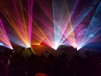 Crowd at music concert at night