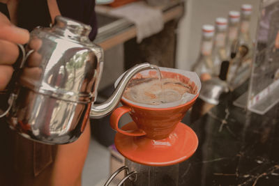 Close-up of coffee cup on table