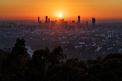 Silhouette of buildings during sunset