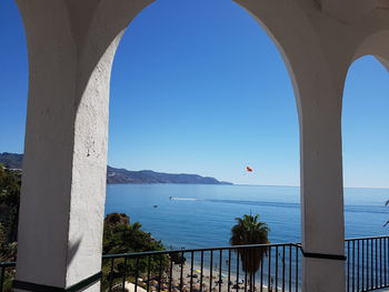 View of calm sea against blue sky