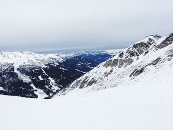 Scenic view of snow covered mountains