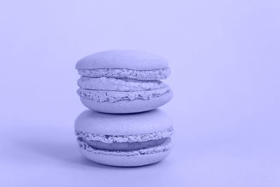 Macaron colored in trendy color of year 2022 very peri background. using color 17-3938