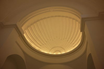 Low angle view of illuminated ceiling