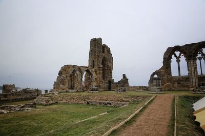 Old ruins of temple against sky