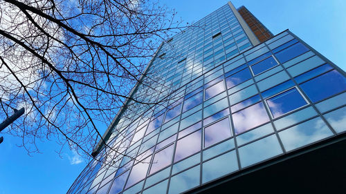 Low angle view of modern building against sky