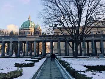 Street leading towards berlin cathedral during winter