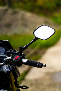 Close-up of bicycle on field