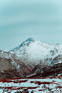 Snow covered mountain against sky