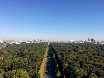 Panoramic view of landscape against clear blue sky