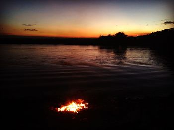 Scenic view of sunset over river