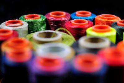 Close-up of colorful thread spools