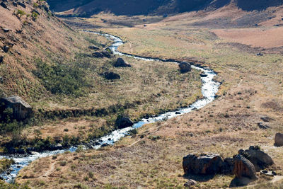 High angle view of stream along road