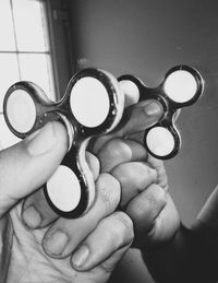 Close-up of hand holding eyeglasses