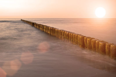 Scenic view of sea at sunset