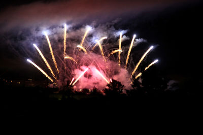 Firework display at night