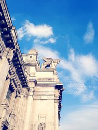 Low angle view of church against blue sky