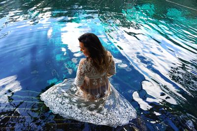 High angle view of woman in swimming pool