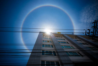 Low angle view of building against blue sky