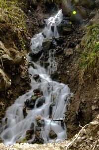 Stream flowing through rocks