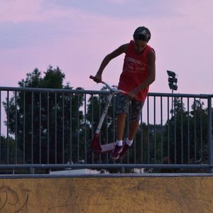 Full length of man against railing against sky