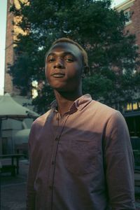 Portrait of young man looking away