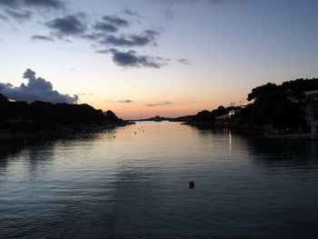 Scenic view of sea against sky at sunset