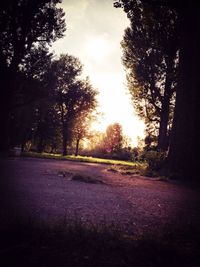 Empty road at sunset