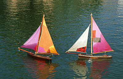 High angle view of sailing boats sailing in sea