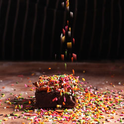 High angle view of multi colored candies on table