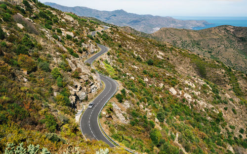 High angle view of winding road on mountain