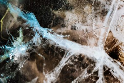 Close-up of water splashing on rocks