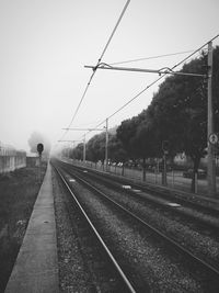 Railroad tracks against sky