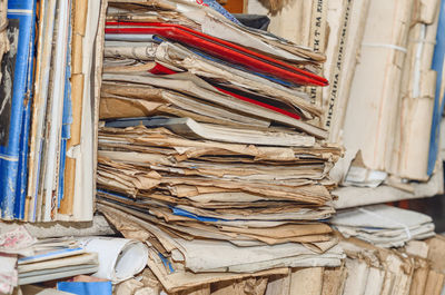 Old paper documents on shelves