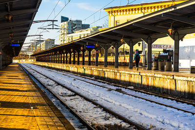 Train on railroad station platform against sky