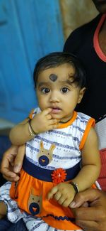 Portrait of cute baby girl at home