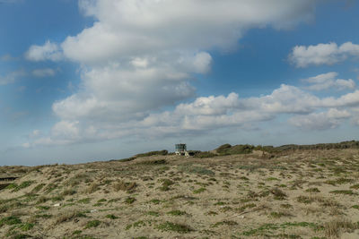 Scenic view of land against sky