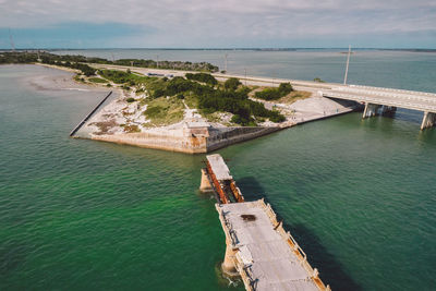 High angle view of pier over sea against sky