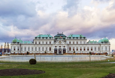 Building against cloudy sky