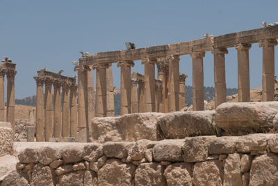 View of old temple against clear sky