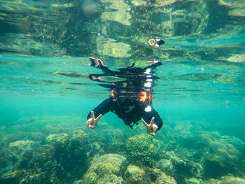 Man swimming in sea