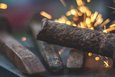 Close-up of sparks fjying on metal spikes