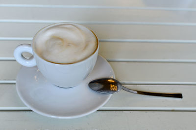Close-up of coffee cup on table