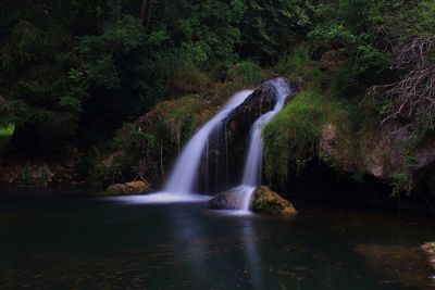 View of waterfall in forest