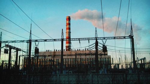 Low angle view of construction site against sky