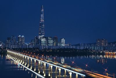 Illuminated buildings in city at night