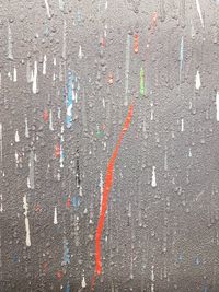 Full frame shot of road sign on wall