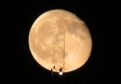 Scenic view of moon against sky at night