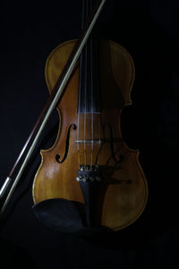 High angle view of violin on black background